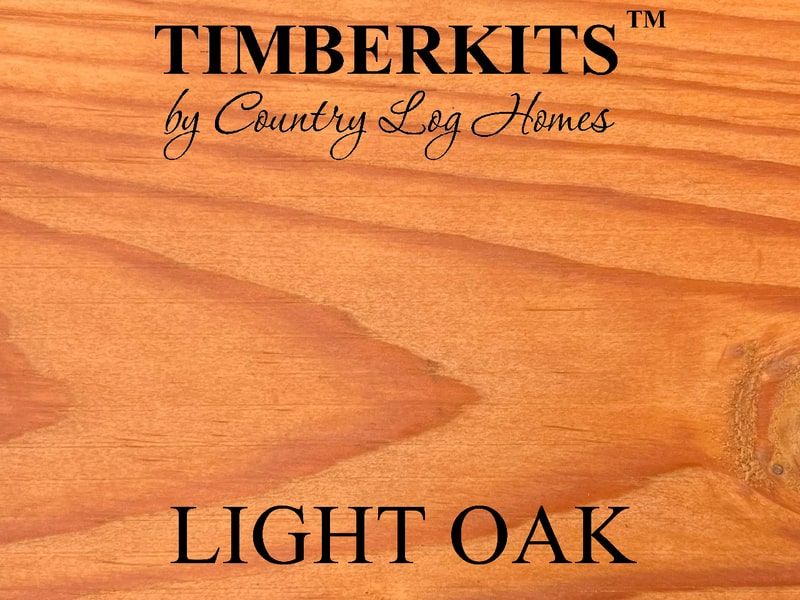 Sample of wood Light Oak stain with logo Timberkits by Country Log Homes